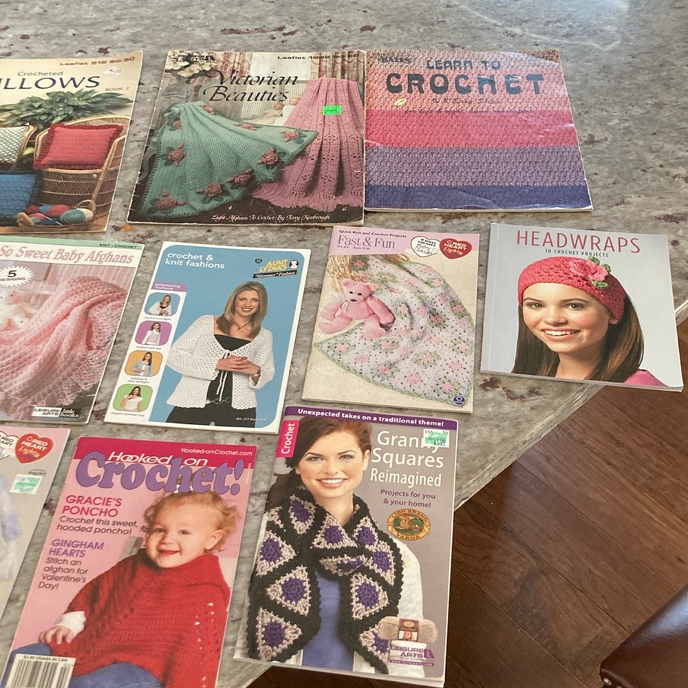 Group of 26 crochet pattern booklets.